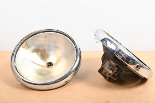 LUCAS: A pair of chrome Lucas headlight rims with reflectors