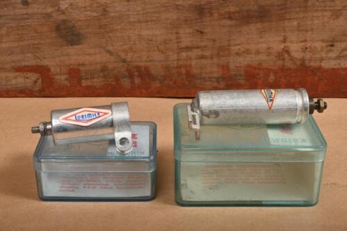 LORIMIER: Two vintage ignition condensers, one being LC 94 and one being RC 33