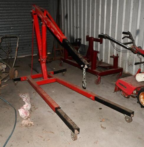ENGINE HOIST: A red engine hoist