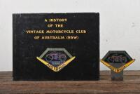 VMCC: A VMCC enamelled motorcycle badge as owned by foundation member Reg Challenger, inscribed "R. Challenger, Foundation Member" and stamped with membership number 10, together with a hardcover book "A History of the Motorcycle Club of Australia (NSW)