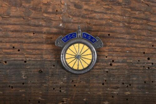 BADGE: A circa 1910 MCC NSW enamelled silver motorcycle club pin badge, stamped to back "G.A. Miller, Sydney, Silver"