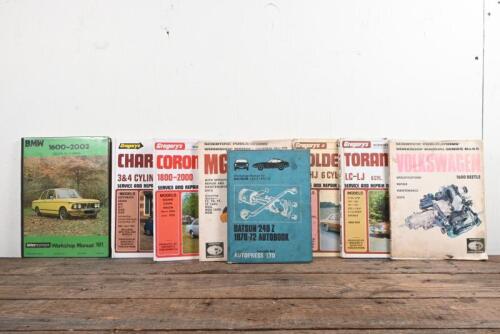 CAR MANUALS: A group of car workshop manuals for various makes including BMW (1600-2002), Daihatsu, Datsun, Holden, MG, Toyota, Volkswagen.
