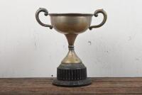 SPEEDWAY: A 1949 NSW Sidecar Championship Trophy won by Jack Carruthers on a Vincent HRD, silverplate on Bakelite stand, 32cm high, silverplate has mostly been rubbed off
