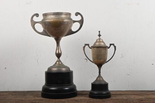 TROPHY: Two silverplate trophies on Bakelite stands won by F. Conceicao, the larger inscribed "Dia De Portugal, De Camores, & Das Comunidades Portuguesas, 1981, Ciclismo" the other "E.S.A.C.C. 1993, Veteran Road Championship, 1st, F. Conceicao