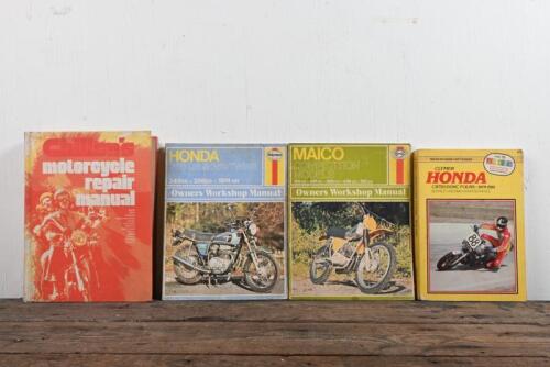 REPAIR MANUALS: A group of four repair manuals including two Honda and one Maico Repair Manual by Haynes.