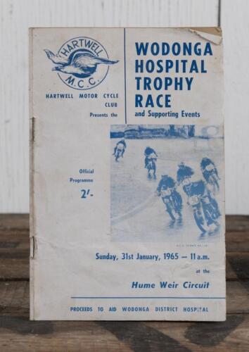 HUME WEIR: A January 1965 'WODONGA HOSPITAL TROPHY RACE and Supporting Events' Official Programme from Hume Weir Circuit, as organised by the HARTWELL MOTOR CYCLE CLUB, 16 pages; marks, holes to some pages.