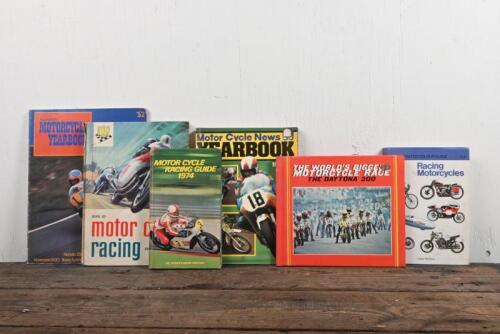 MOTOR CYCLE RACING: A group of hardcover books detailing motor cycle racing including Year Books.