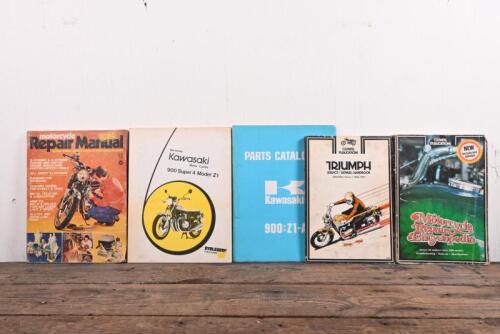 REPAIR MANUALS/PARTS: A group of English and Japanese Repair Manuals and Parts Catalogue, including Kawasaki and Triumph manuals and parts catalogue.