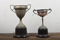 O J ASHFORD: Two silver plate trophies won by O.J. Ashford, the "6 Hours Trial, 1938" and another, both presented by E.S.M.C.C., tallest 30cm high, would benefit from a clean