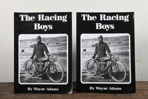 THE RACING BOYS: Two softcover copies of 'The Racing Boys' by Wayne Adams, Book No '0138' with personalised message signed by Wayne Adams, with additional copy numbered '0797'.