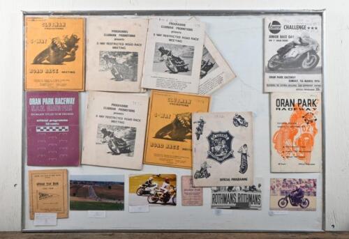 MEMORABILIA: A collection ephemera in a frame, including an Official Year Book from the Singer Car Club of NSW 1935-1936, framed and glazed, 62 x 84.5cm