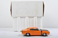 VALIANT: A Trax 1:24 scale 1971 VH Chrysler Valiant Charger (TX 034) in orange
