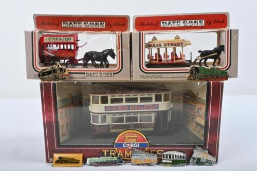 TRANSPORTATION: A collection of transportation models and pin badges. CORGI TRAMLINE 'Portsmouth Corporation' tram (C993/1) & Lledo DAYS GONE horse bus models. Tram & Train pin badges
