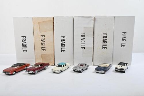 1960's CLASSIC CARS: A collection of 1960's Classic Cars by Franklin Mint in 1:43 scale. 1963 Buick Riviera, 1964 Pontiac GTO convertible & 1968 Dodge Charger R/T