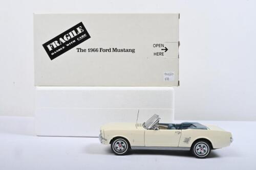 FORD: A The Danbury Mint 1:24 scale 1966 Ford Mustang. White