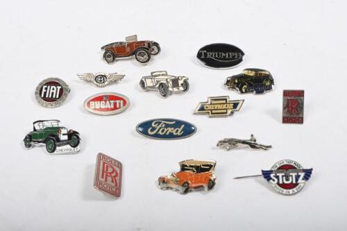 CAR BADGES: A quantity of car badges. Bugatti, Chevrolet, FIAT, Rolls-Royce, Stutz&nbsp;emblem badges