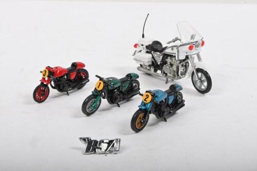 MOTORCYCLES: A small collection of 1:43 scale motorcycles. Kawasaki Police 1000 & circa 1960's racing motorbikes. BSA pin badge