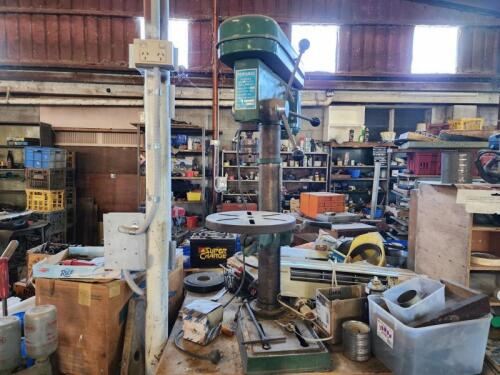 DRILL PRESS: A Powamac 16 speed heavy duty drill press