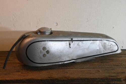 PETROL TANK: An aluminium&nbsp;petrol tank from a Japanese motor cycle, 20cm high, 62cm wide, 20cm deep