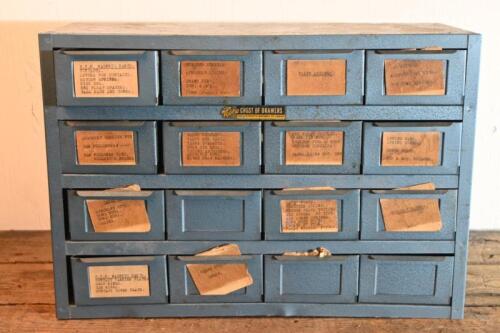 PARTS CHEST: A small metal chest&nbsp;of eighteen compartments, containing various smaller parts including magneto parts, nuts, bolts, valve springs, slip rings etc.