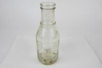CALTEX: A 'Caltex' New Zealand one imperial pint embossed glass oil bottle.