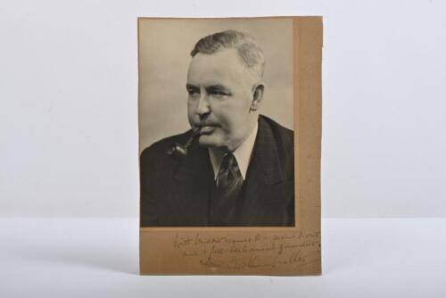 IRVING/WALKER: A black and white picture of Graham Walker, editor of 'MOTOR CYCLING'. Graham Walker signature