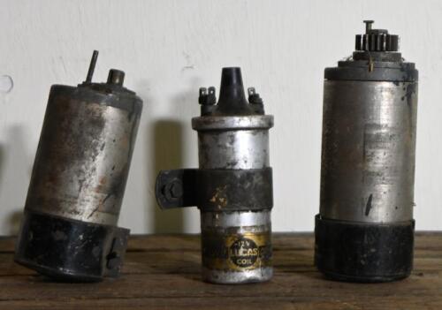 GENERATORS: Two early Lucas 6V generators, smaller unit stamped "E3L-L-0, 20011A", larger unit "E3HM-LO, 200285", together with other related parts in timber box