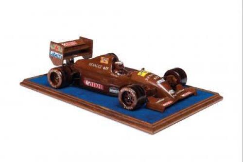 NIGEL MANSELL: A hand carved Blackwood timber model of the 1992 F1 Williams FW14&Acirc; signed by Mansell