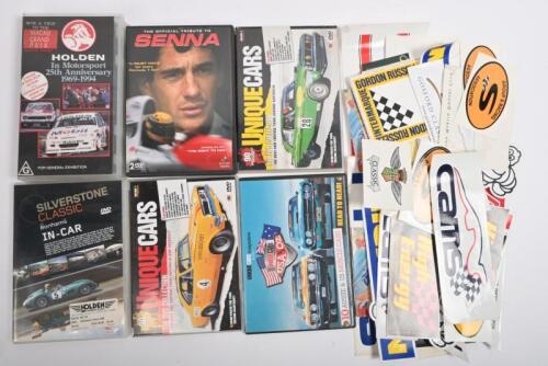 AUTOMOBILIA: One lot of automotive classic labels including Wurth, Goodwood, GB Sealink, Avon, Brooklands UK, PBR, Edelbrock, Holley, CAMS, Michelin, Maserati, Group S Racing, Aston Martin, Chevrolet. Five DVDs of cars - One Senna DVD. One Holden 25th ann