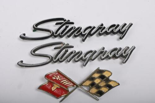 CORVETTE: Two Stingray side badges and one front&nbsp;chequered flag badge.