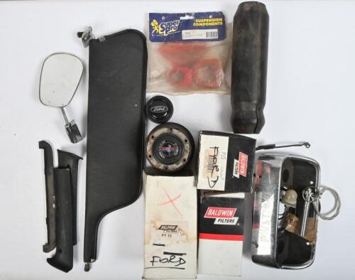 FORD: One Ford Mustang steering wheel boss. One Mustang radio panel. One exterior bonnet pin assembly. Three filters. Two interior windscreen finishers. One horn button. A steering rack mount kit. One Mustang sun visor