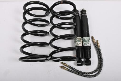 JAGUAR: XJS. One NOS pair of front springs. Two NOS brake lines. One pair of shock absorbers.
