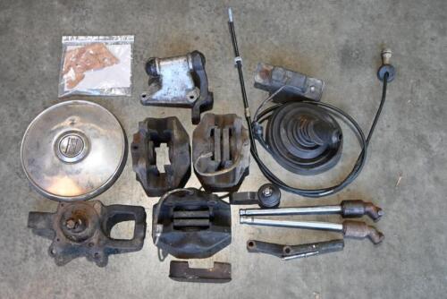 ALFA ROMEO / FIAT: One yellow box containing Alfa 1750 brake calipers and suspension parts. One Fiat hub cap.