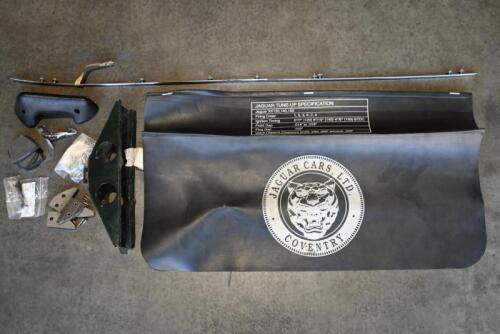 JAGUAR: XK150. One box containing spare wheel lock down frame. One arm rest. One set of hand brake pads. One set of bonnet buffers. One packet of rivets. One XK150 centre chrome bonnet strip. One Jaguar Coventry Mechanics mud guard protector.
