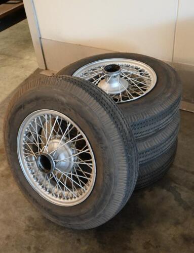 JAGUAR: One set of silver painted 16x5 inch wire wheels. Fitted with 6.00 - 16 LT Kumho tyres. To suit Jaguar XK120 / 140 / 150 cars.