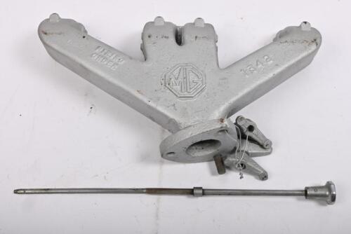 MG "T SERIES": One Exhaust manifold assembly and MG dipstick.