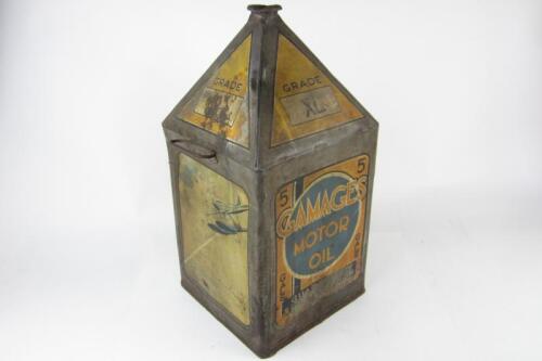 GAMAGES OIL TIN: A rare and impressive 5 gallon, 4 panel 'Gamages' pictorial oil tin, featuring land, air and sea motifs