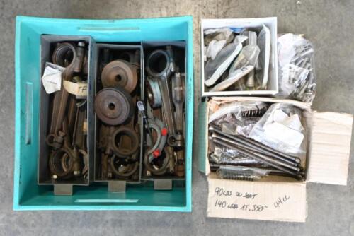 MG: "T-SERIES" PARTS. One green box of parts. Ten connecting rods. Valve springs and pushrods. Two sets of NOS Connecting rod bolts and nuts. 20 door hinge pins.