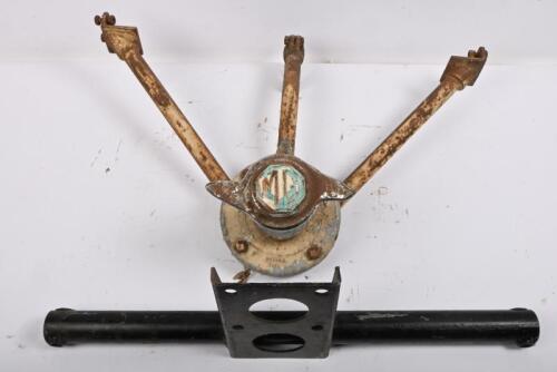 MG: "T-SERIES". Spare wheel mount with spinner and base mount.