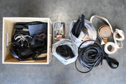 MG: "T-SERIES". One box of body to chassis insulating tapes, felt sections, sealing rubbers. Box of miscellaneous hood parts.
