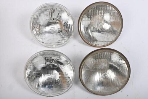 HEAD LAMPS: One pair of semi-sealed Lucas headlamps. One pair of seal beam headlamps.
