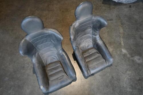 SEATS: 2 leather covered competition style wrap around seats. Believe last used in early 911 Cup car.