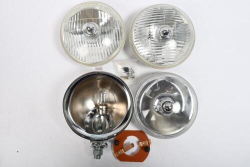 LAMPS: Two NOS Lucas style SLR driving lamps for assembly. Plus Two SLR 5 inch driving lamp lens assemblies.