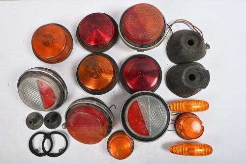 LAMPS: Six round tail lamps. Two round blinker assemblies. Two Ford side flasher units.