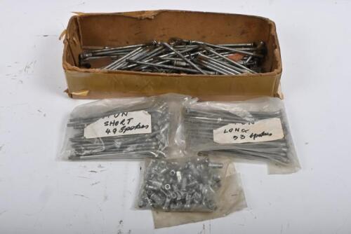 WIRE WHEEL SPOKES: One box of chrome wire wheel spokes and knuckles. Over 100 Pieces.