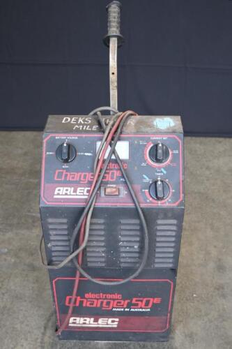 ARLEC: One Arlec Electronic series 50E battery charger/starter. 6 / 12 / 18 / 24 / 36 volt options. Unit incorporates two wheel trolley.