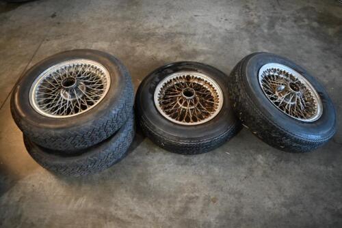 WHEELS: One set of four 15 inch chrome wire wheels. To suit Aston Martin / Triumph / Austin Healey.