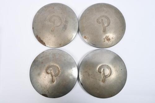 PEUGEOT: A set of 4 original Peugeot hub caps circa 1950s