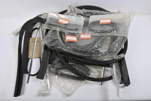 PORSCHE: 356 PARTS to suit T6 and C model coupes. One box containing NOS moldings, gaskets, body seals, vent seals, window trims, rear windscreen mold and drive belt.