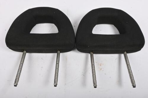 VOLKSWAGEN​​​​​​​: One pair of later model black fabric covered head rests, suit series 2.